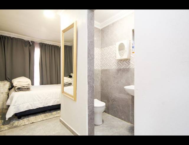 4 BEDROOM TOWNHOUSE FOR SALE IN ROOIHUISKRAAL NORTH
